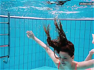 3 nude damsels have fun underwater