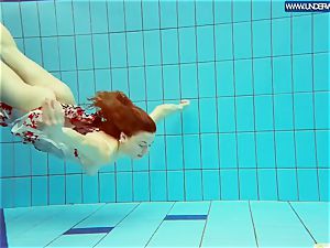 super-hot grind red-haired swimming in the pool